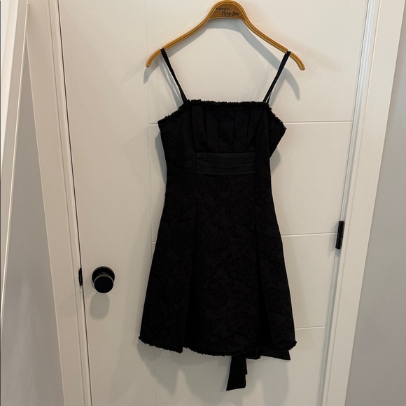 BCBGMaxAzria Dresses & Skirts - BCBGMaxAzria Black Textured Spaghetti Strap Dress size 4